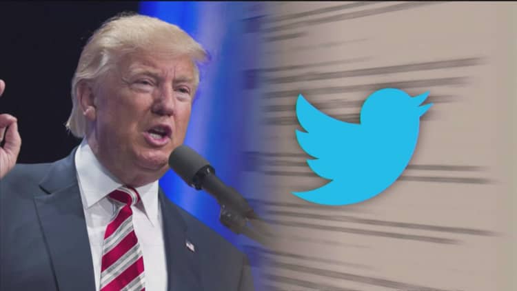 Trump retweets man calling him a fascist and a 'Trump train' rolling through a CNN logo