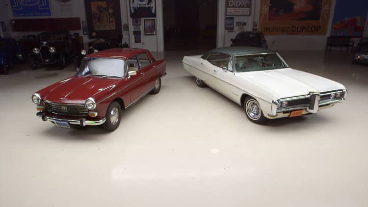 Here's the current value of the '66 Peugeot 404 and '68 Pontiac Bonneville
