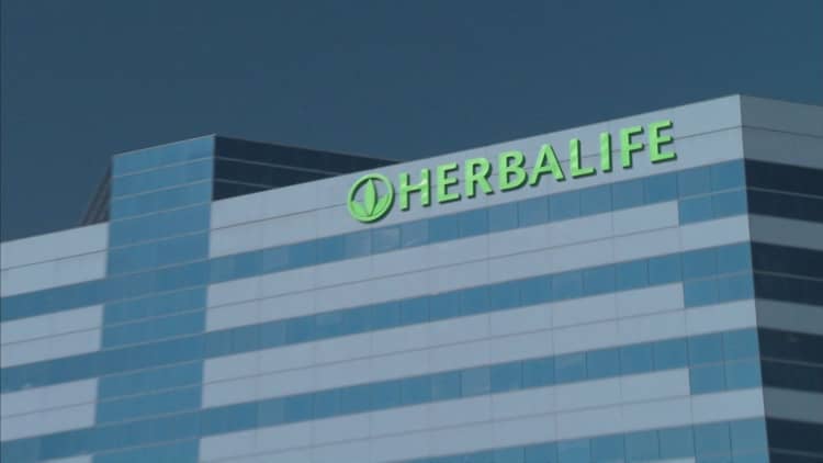 Herbalife had talks to go private; steps-up pressure on long-time nemesis Bill Ackman with tender offer