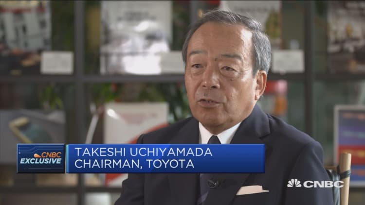 Toyota chairman: Skeptical of rapid shift to pure electric vehicles