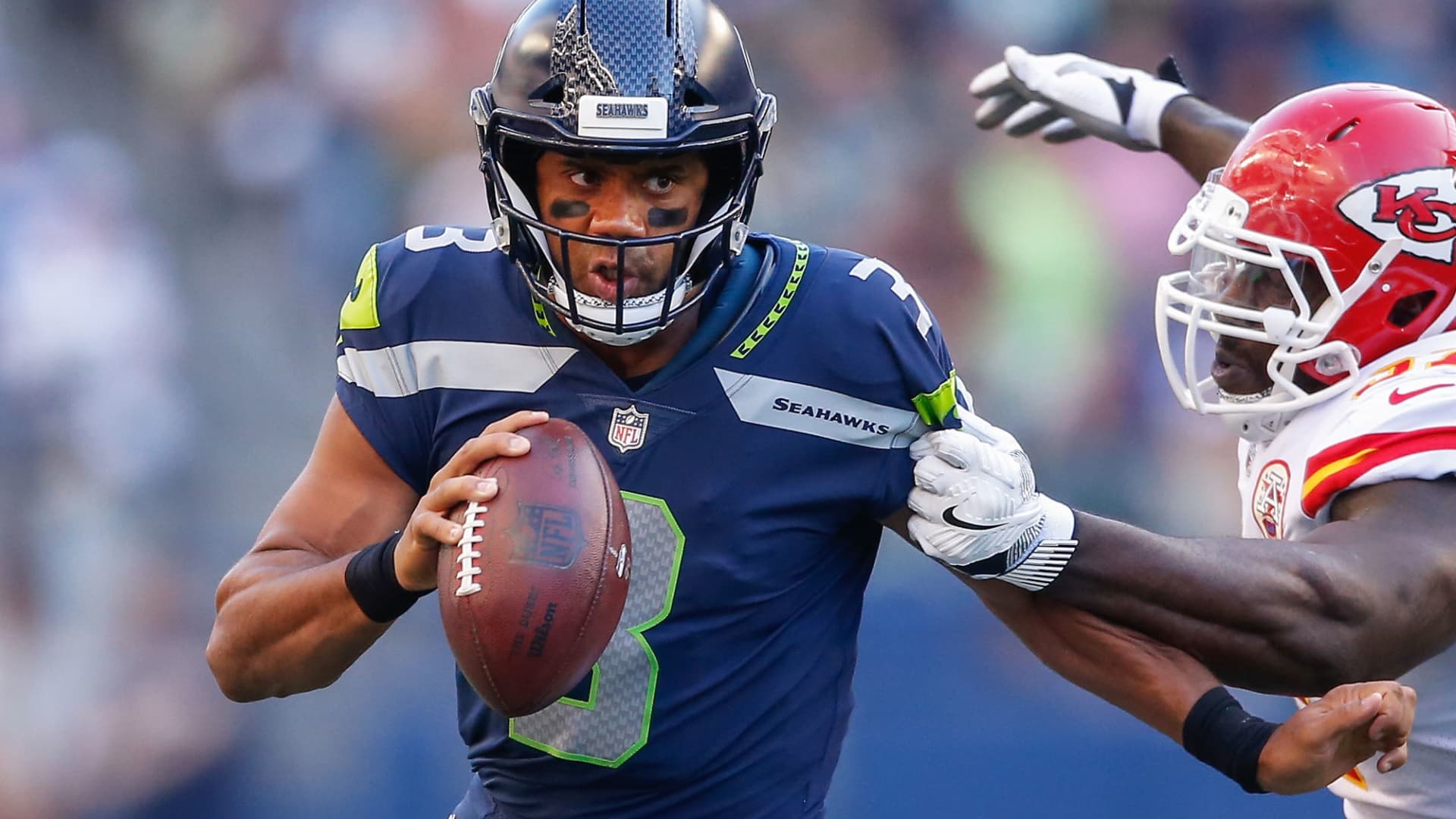 Russell Wilson unveils new logo that looks just like every other athlete's  logo