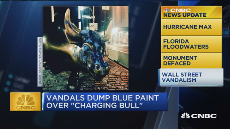 Vandals dump blue paint over Wall Street's 'Charging Bull"