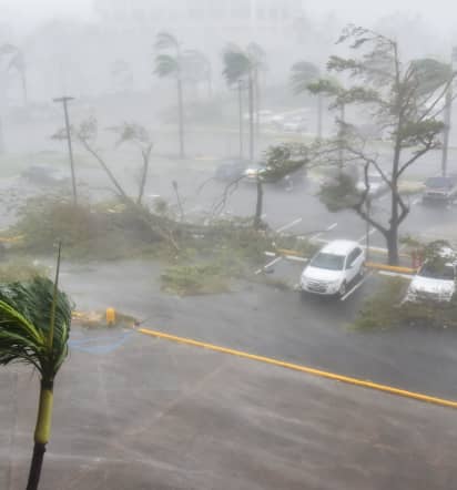 Hurricane Maria weakens to Category 2 storm after leaving Puerto Rico completely without power