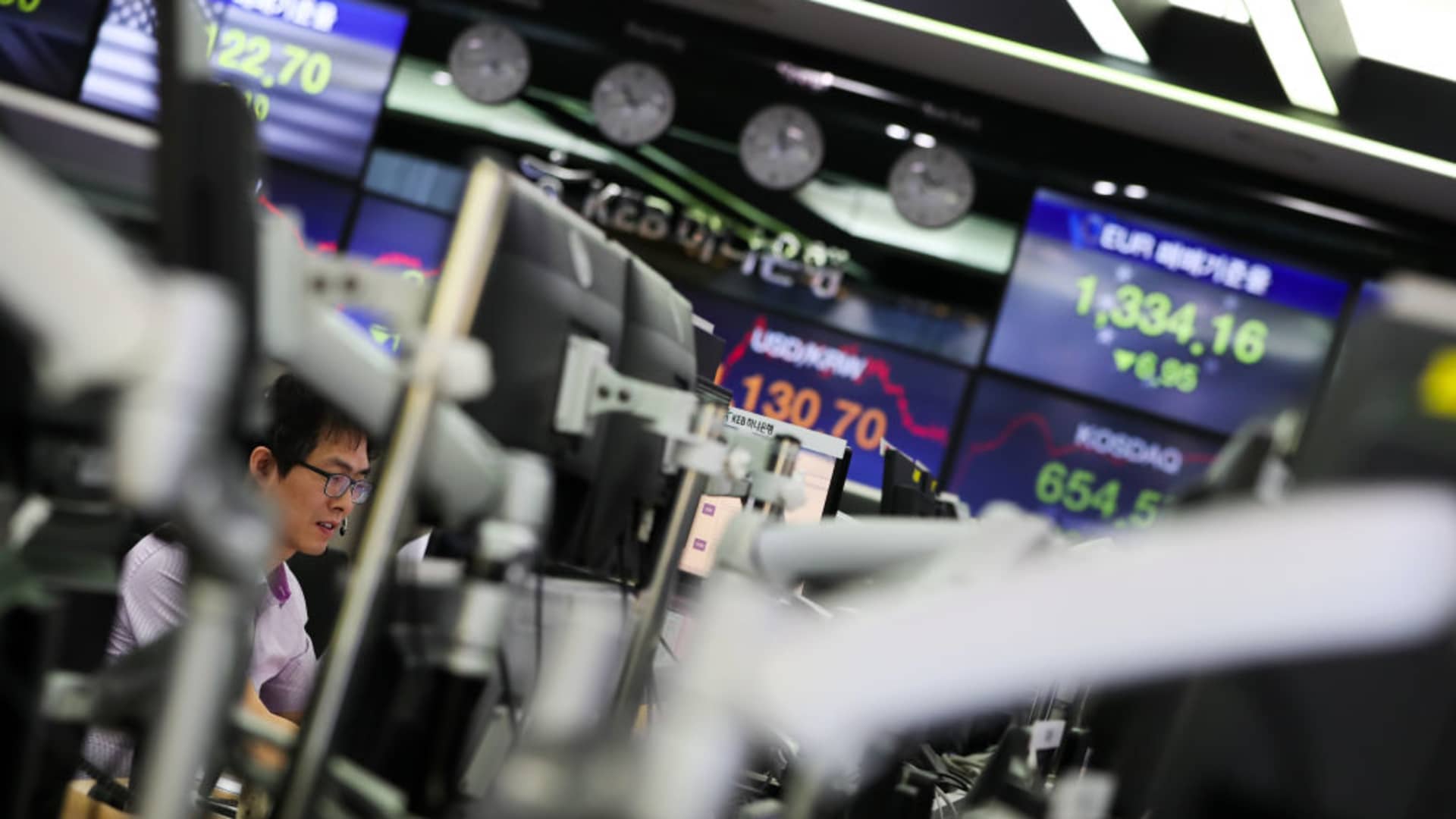 Evergrande shares plunge after Hong Kong court orders liquidation; Hang Seng gains over 1%