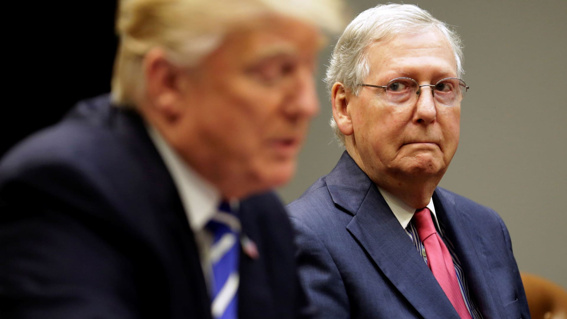 Senate Majority Leader Mitch McConnell (R-KY) listens as U.S. President Donald Trump speaks during a meeting Republican Congressional leaders in Washington, D.C.