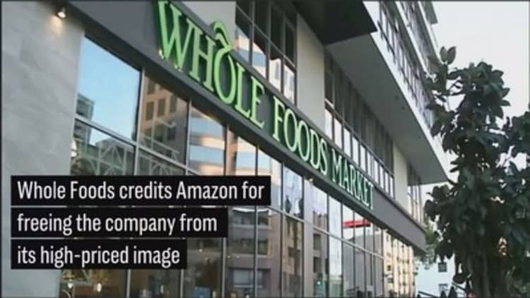 Whole Foods CEO says Amazon helped escape high-priced image
