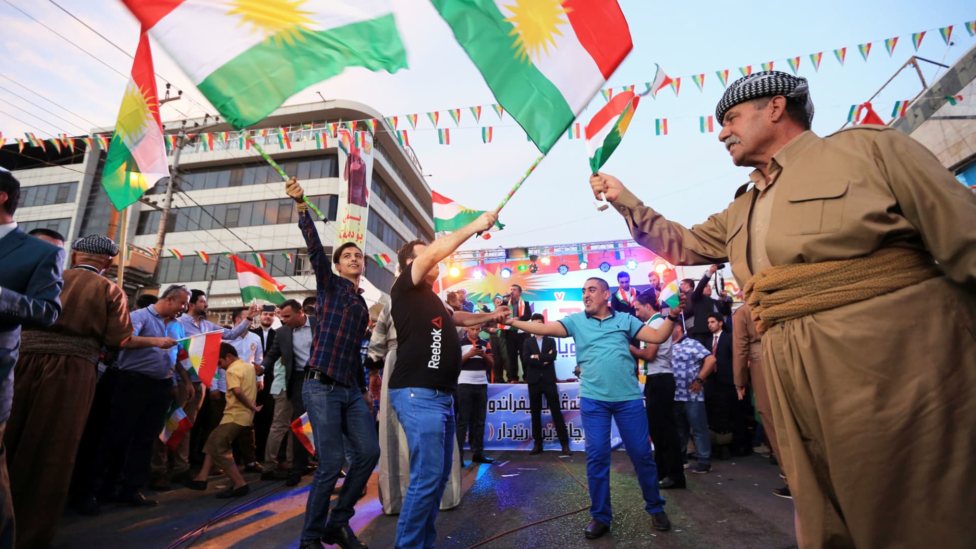 Kurds celebrate to show their support for the independence referendum in Duhok, Iraq, September 26, 2017.