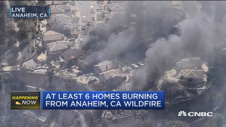 At least six homes burning as wildfires break out in Anaheim, California