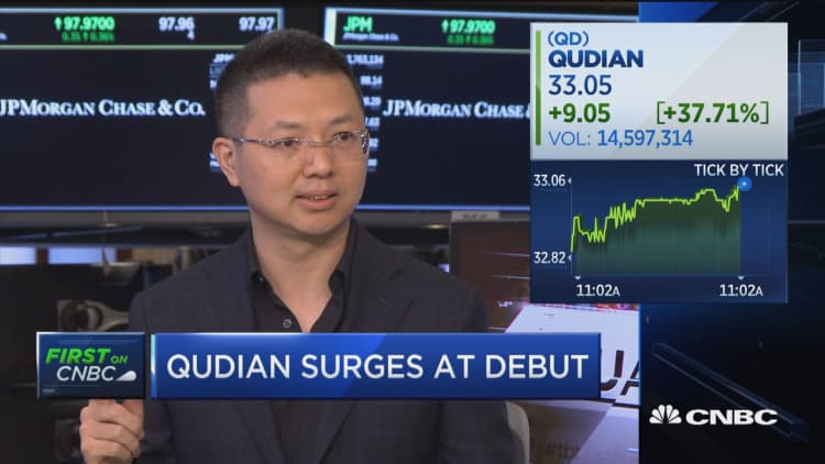 Consumer lending company Qudian surges on opening trades