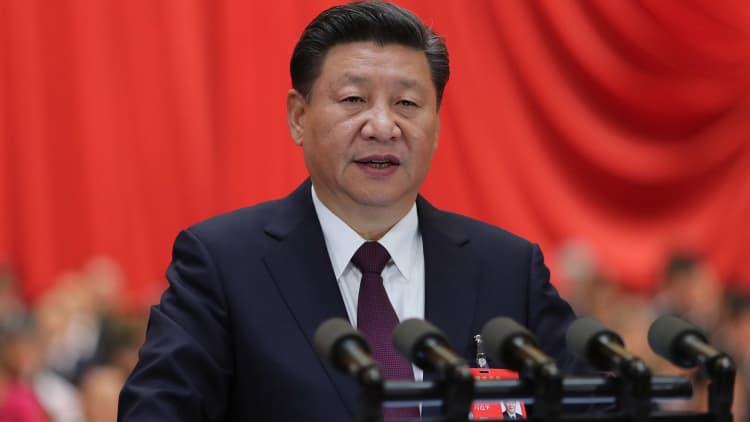 Xi: China wants a deal, but is not afraid to 'fight back'