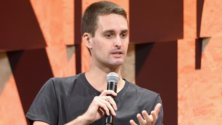 Snap plunges on revenue and user miss