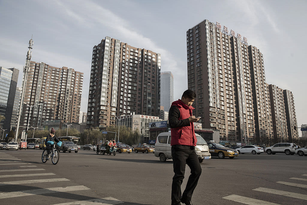 Chinese developer misses bond payment as stress spreads beyond Evergrande crisis