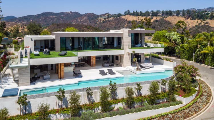 Take a look inside this $29.5 million mansion with a private nightclub and doors that open by fingerprint