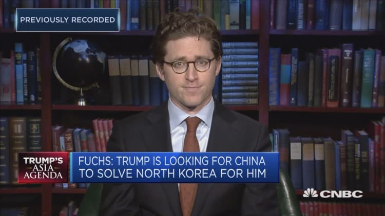 This analyst says Trump needs to 'get down to business' with Xi