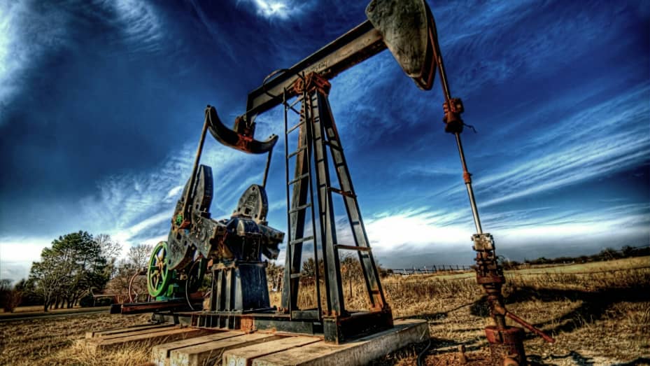 Oil slips after IEA lowers demand forecast