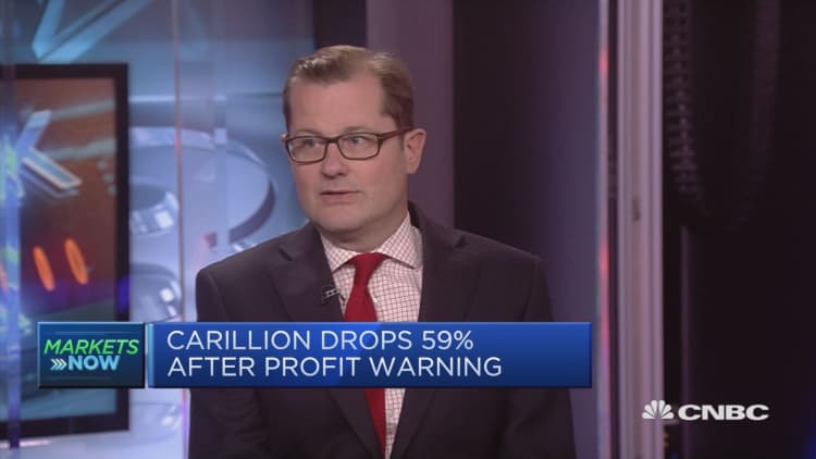 Carillion drops 59 percent after profit warning