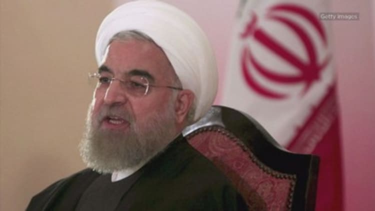 Iran President Hassan Rouhani declares the end of Islamic State