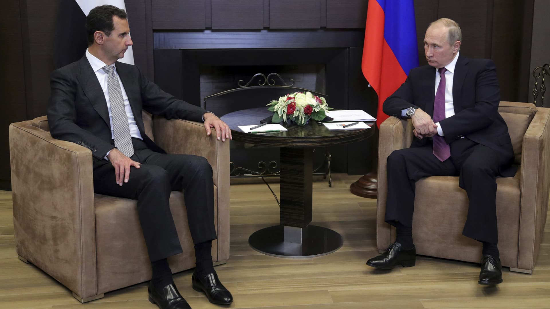 Russian President Vladimir Putin (R) meets with Syrian President Bashar al-Assad in the Black Sea resort of Sochi, Russia November 20, 2017.