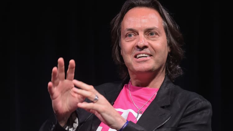 T-Mobile shares drop on talk that CEO could become the next WeWork CEO