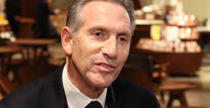 Starbucks stock falls as interim CEO Howard Schultz suspends share buybacks 