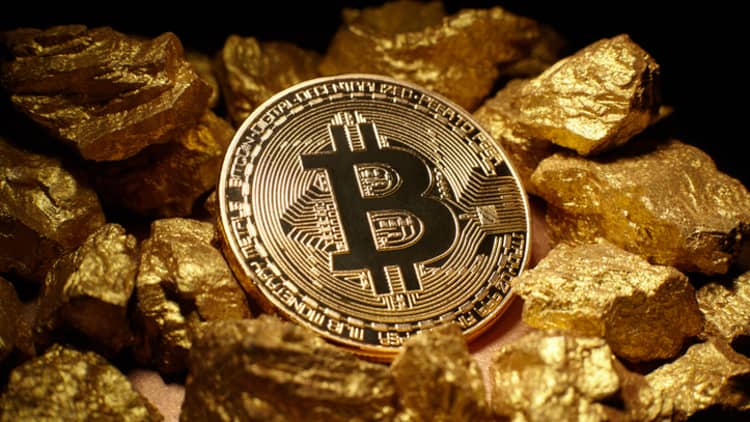 Why some investors are turning to bitcoin and gold as a 'safe haven'