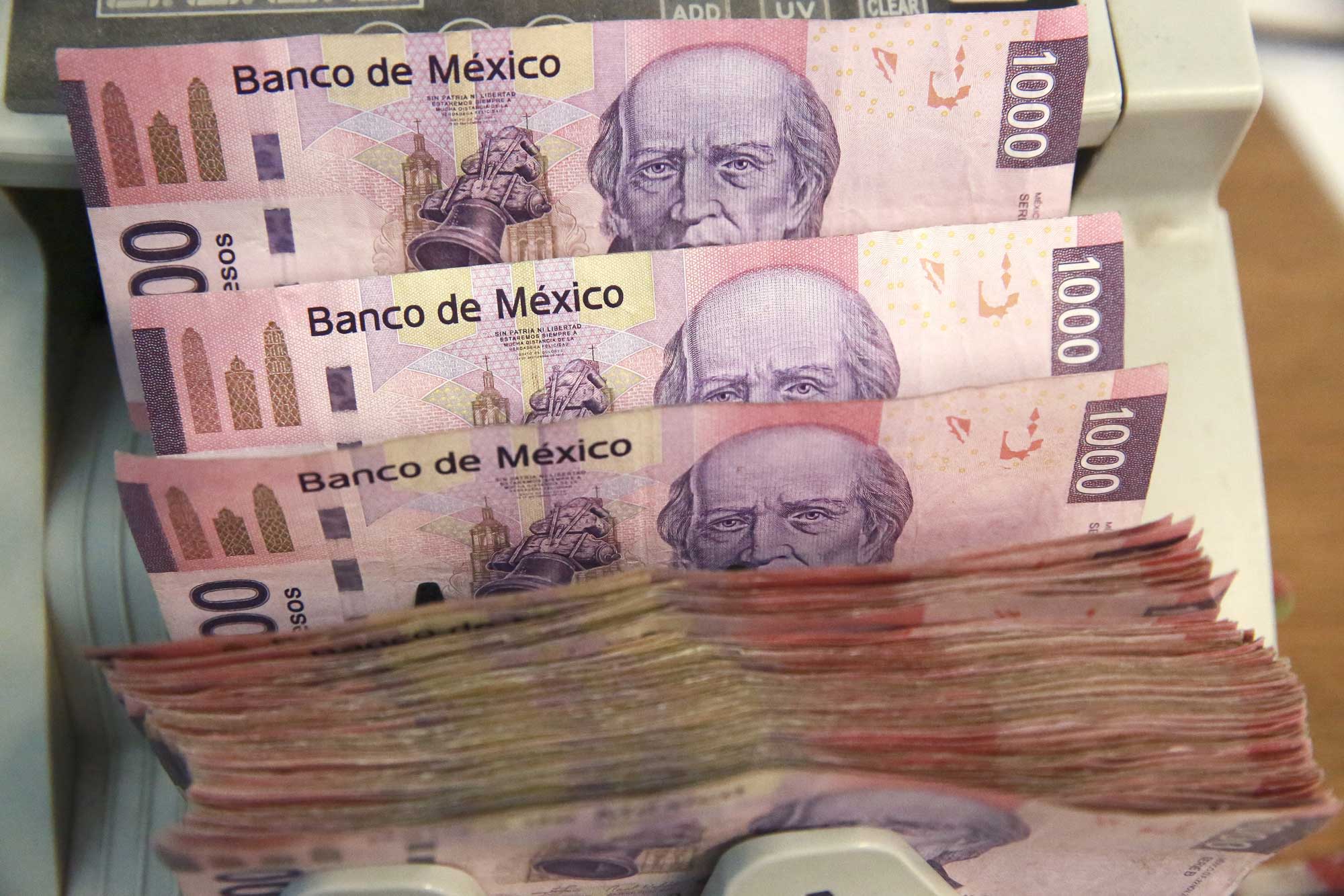 explain currency rates in mexico to us dollar