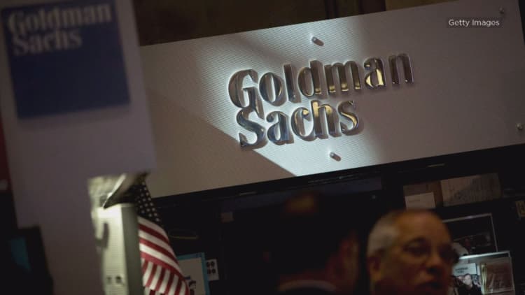 Goldman taking $5 billion hit from new tax law