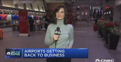 Airports get back to business after massive winter storm cripples travel in Northeast