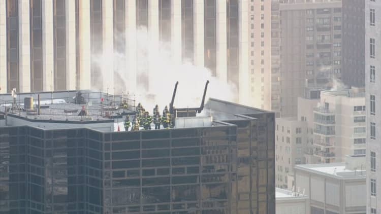 Fire crews are responding to a rooftop fire at Trump Tower