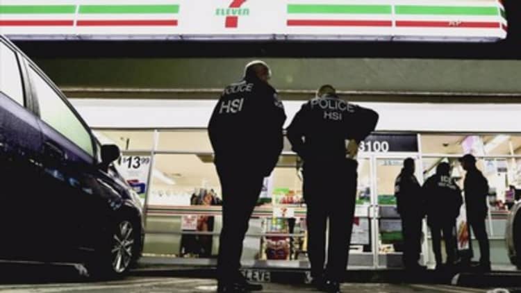 Immigration agents raid dozens of 7-Eleven stores