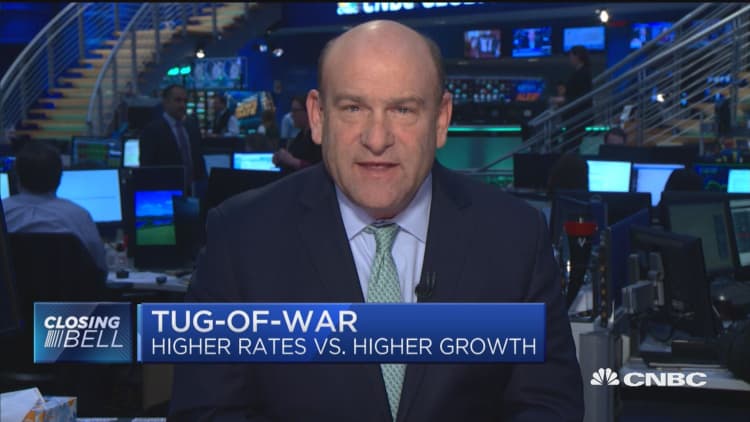 Tug-of-war between higher rates and higher growth