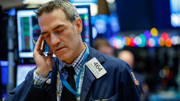 Dow tumbles nearly 1,600 points at session lows