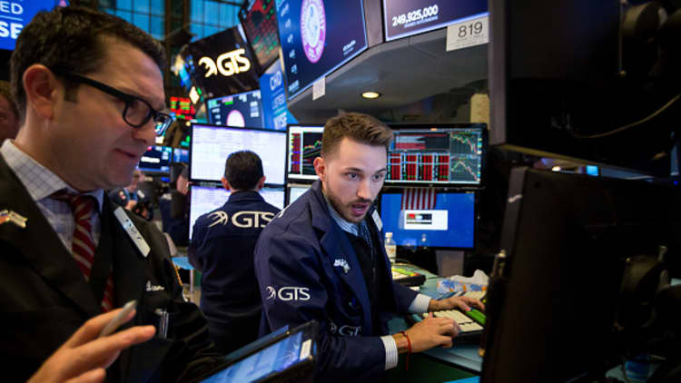 Dow drops nearly 700 points at session lows