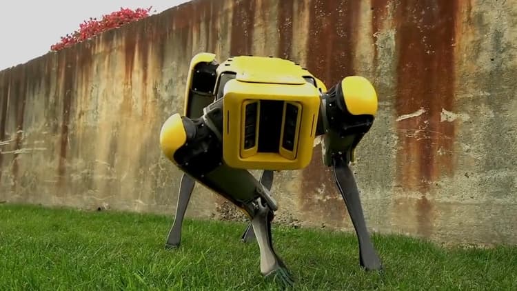 Boston Dynamics’ SpotMini robot has a new trick: it can now open doors