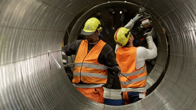 Workers during the production process of pipes at the Nord Stream 2 facility at Mukran on Ruegen Islandon in Sassnitz, Germany.