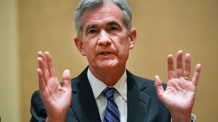 Fed sees economy past full employment