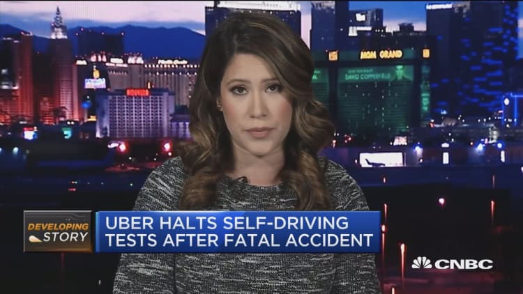 Uber halts self-driving tests after deadly accident