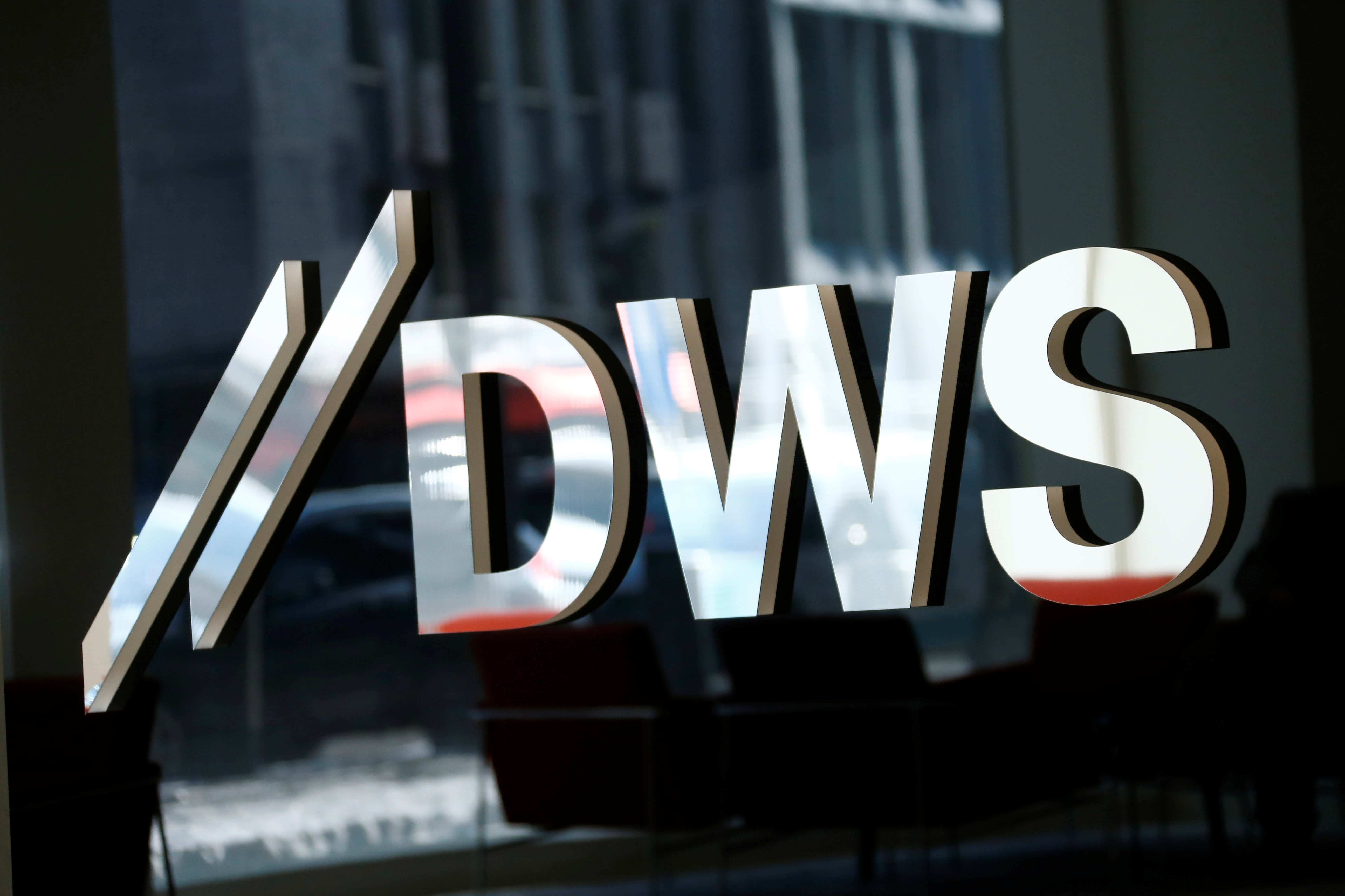Shares Of Deutsche Bank s DWS Edge Higher In Stock Market Debut