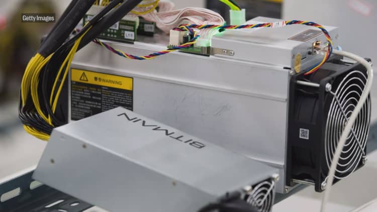 Secretive Chinese bitcoin mining company just revealed a new chip that could hurt AMD, Nvidia