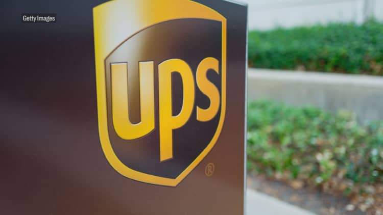 Amazon and UPS have been fighting over the post office's cost structure long before Trump