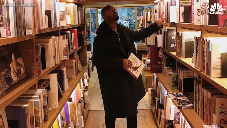 Ex NFL player Martellus Bennett says his biggest splurge is books — and he has 3,500 of them