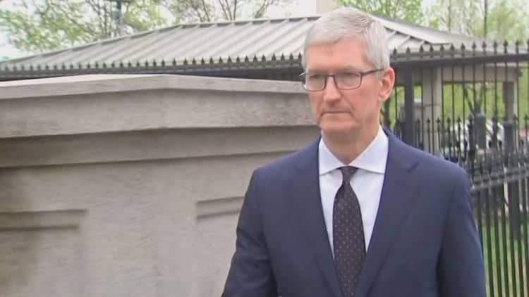 Apple CEO Tim Cook arrives at the White House
