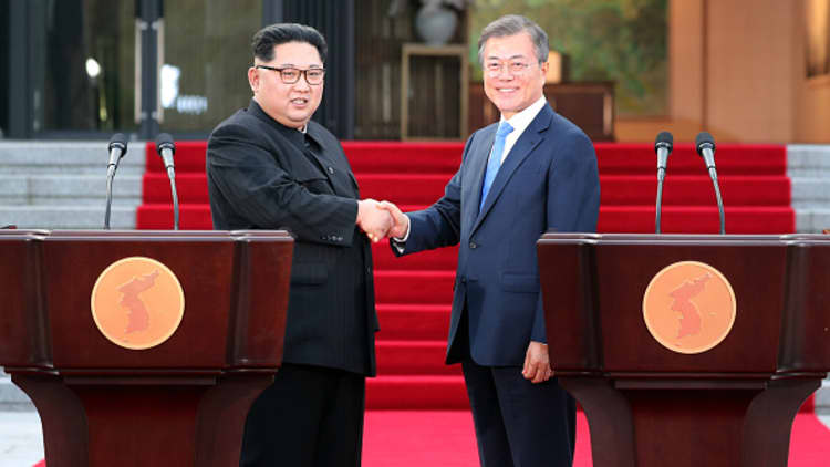 Korean leaders pledge to end war