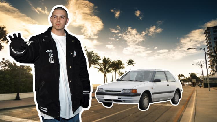 Pitbull spent his first $1,500 paycheck on a car for his mom