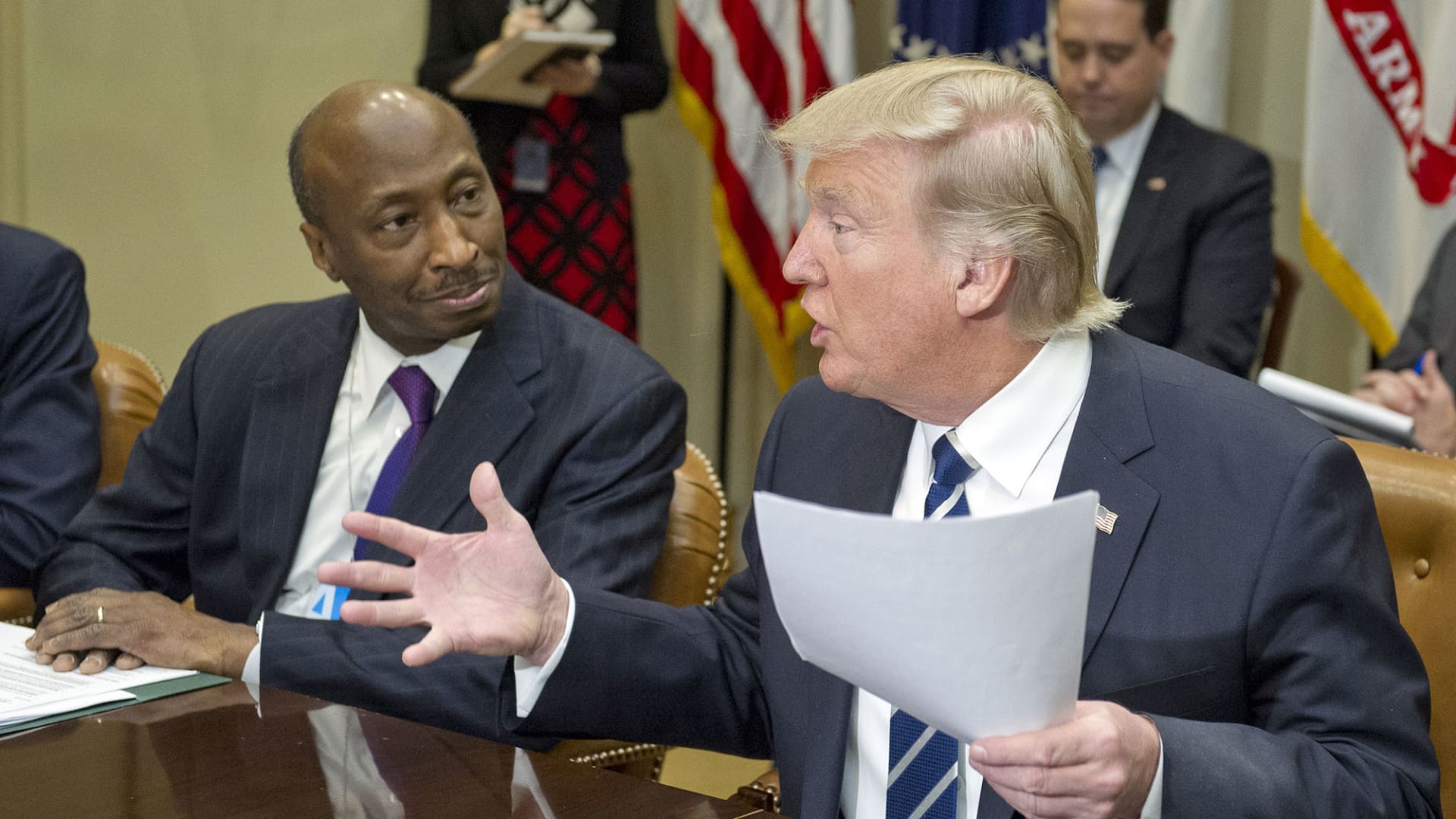 President Donald Trump, right, speaks as Ken Frazier, chairman and chief executive officer of Merck & Co., listens during a meeting with representatives from the Pharmaceutical Research and Manufacturers of America (PhRMA) at the White House in Washington, D.C., U.S., on Tuesday, Jan. 31, 2017.