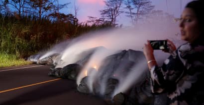 Hawaii officials order some residents to flee from fast-flowing lava