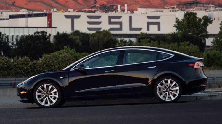 Tesla shares rise after analyst raises Model 3 delivery estimate