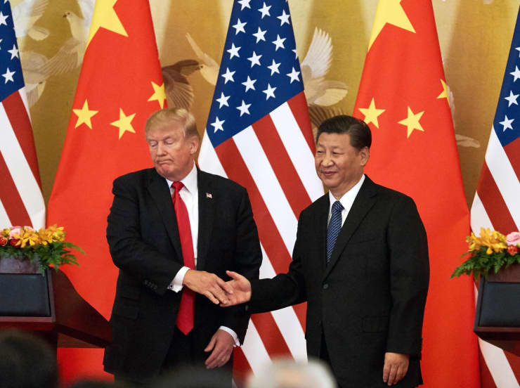 Trump tells China to ‘act now’ on trade or face a ‘far worse’ deal in his second term 105276862-GettyImages-872107540