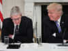 Apple CEO Tim Cook with U.S. President Donald Trump during a meeting of the American Technology Council on June 19, 2017.