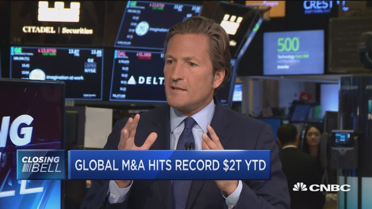 Global M&A hits record $2 trillion year-to-date